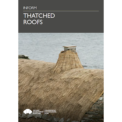 Cover page featuring a photograph of a thatched roof 