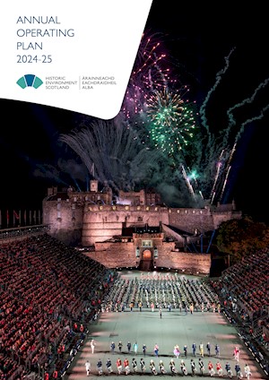 Front cover of the annual operating plan, an aerial view of Edinburgh Castle in the dark during the Edinburgh Military Tattoo and fireworks going off