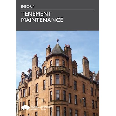 A cover photo featuring a block of tenements