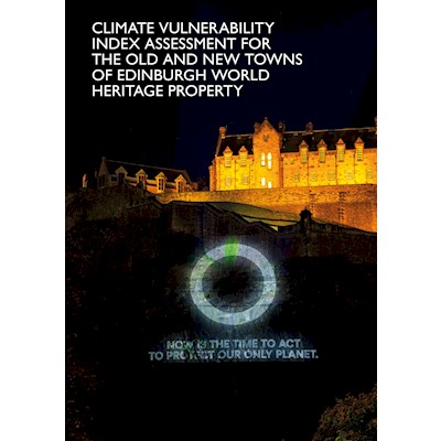 Edinburgh Castle at night, with the words "now is the time to act to protect our only planet" projected on to castle rock.