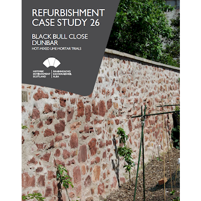 Cover image showing a stone wall at black bull close in Dunbar refurbished and bound with lime mortar 