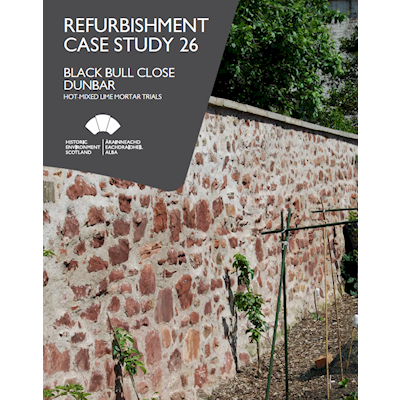 Cover image showing a stone wall at black bull close in Dunbar refurbished and bound with lime mortar 