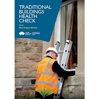 A cover page featuring a person up a ladder inspecting an older building's window
