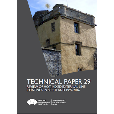 Paper cover featuring a photo of a building coated in lime